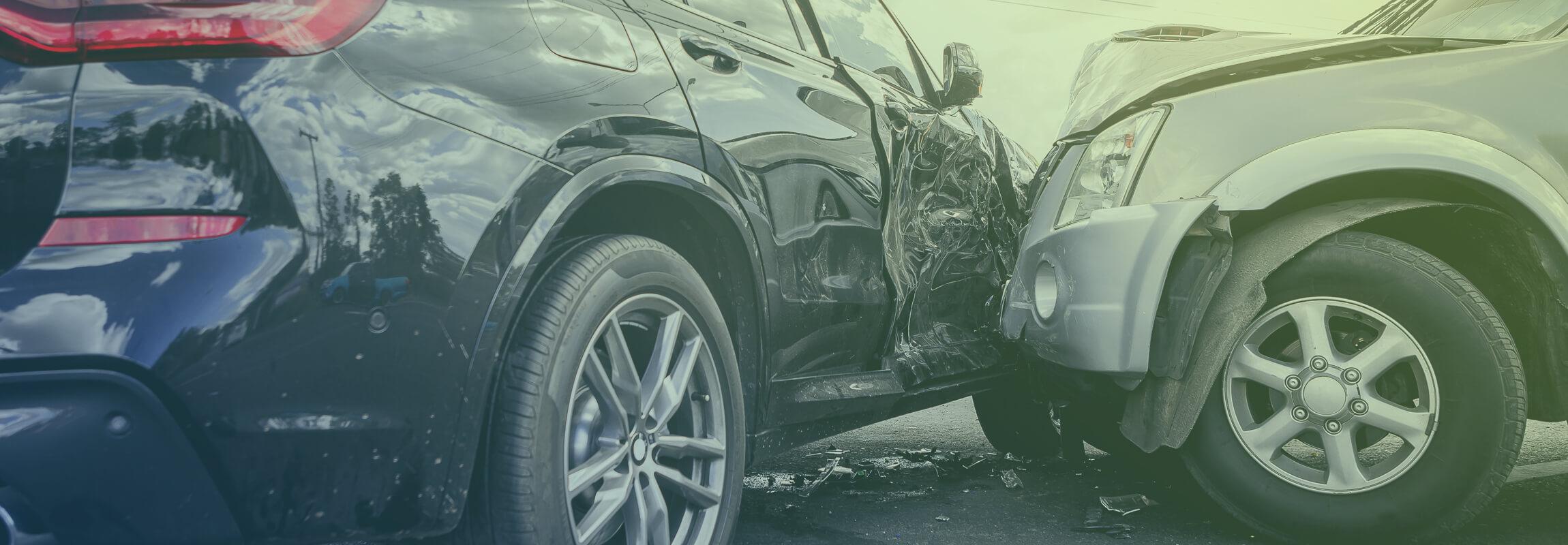 two cars crashed together after car accident