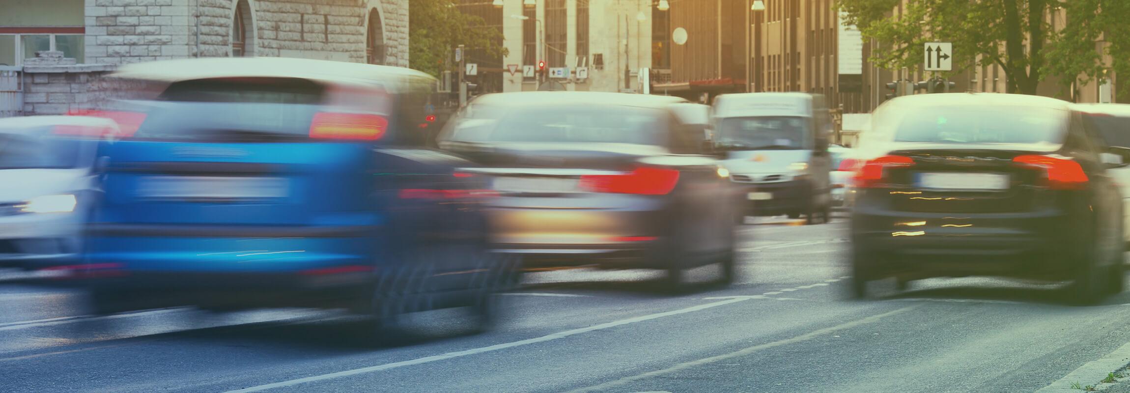 cars moving in busy street
