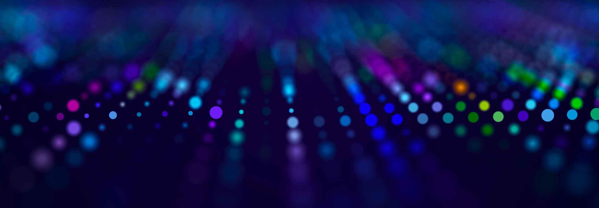 blue background with brightly colored digital dots
