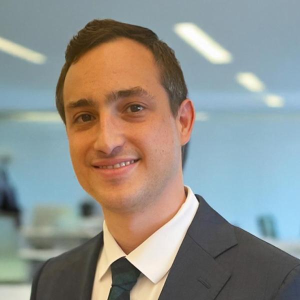 man with grey suit and brown hair